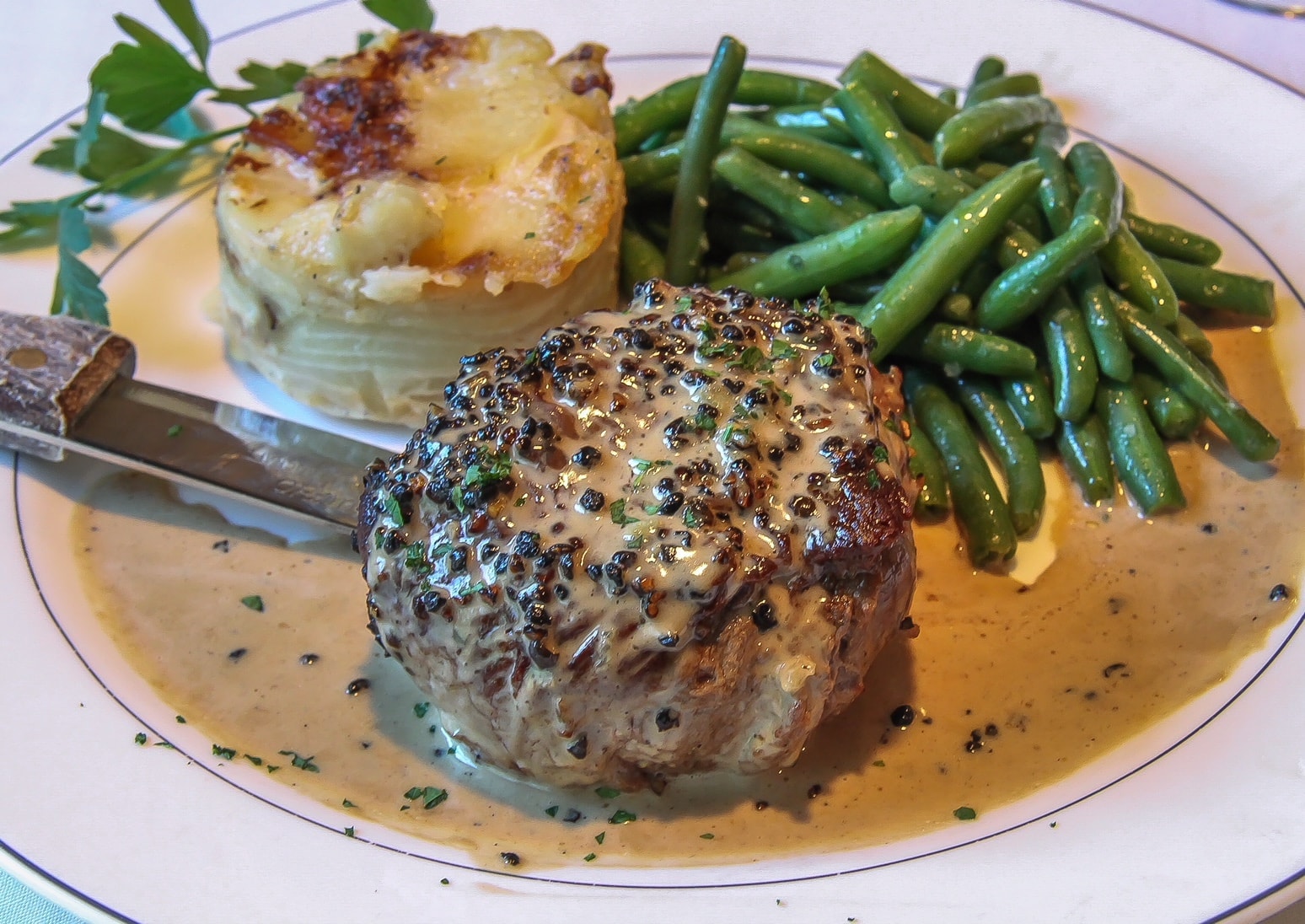 Peppercorn filet with potatoes and green beans at Crane's Tavern